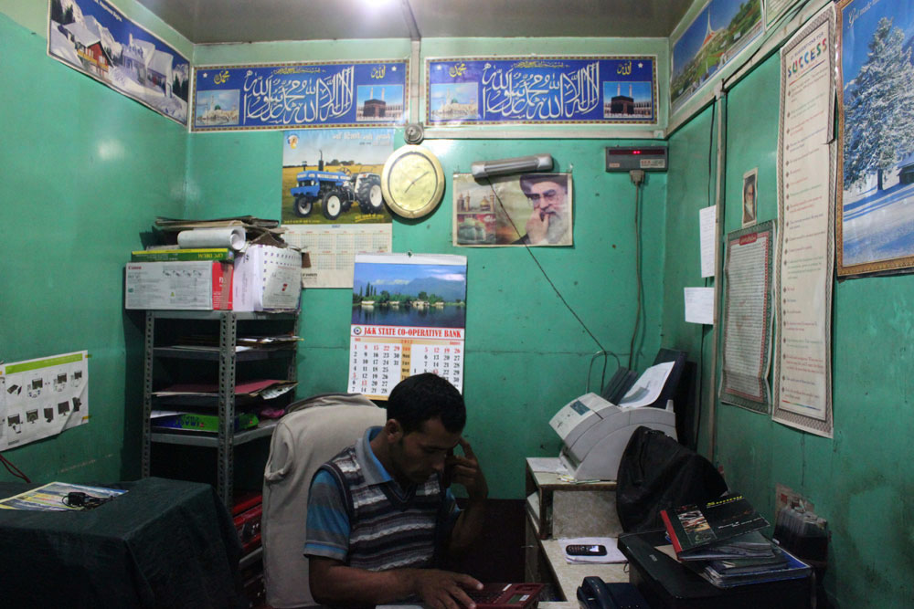 Telephone Booth main bazar, Kargil, assortment of Shia iconography